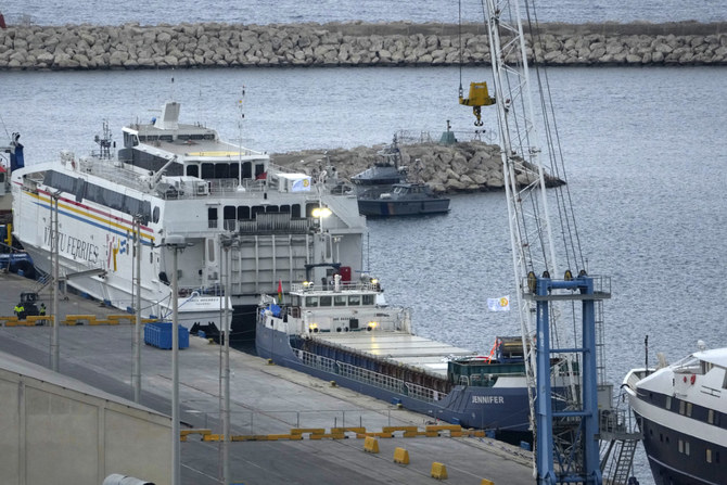The second vessel, left, with food aid from aid group World Central Kitchen prepares to depart for Gaza, at Larnaca port, Cyprus, on March 16, 2024. (AP)