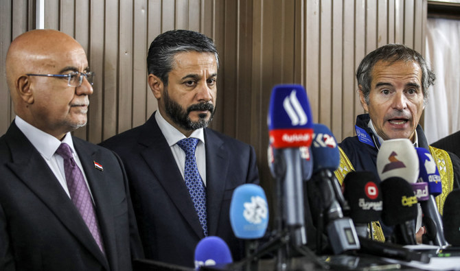 Rafael Grossi (R), Director General of the International Atomic Energy Agency (IAEA), speaks to the press during a tour with Iraq’s Higher Education Minister Naeem al-Aboudi (C) and Health Minister Saleh al-Hasnawi (L) in Baghdad on March 18, 2024. (AFP)
