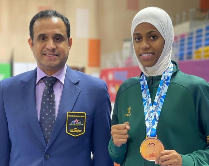 Saudi Taekwondo Federation President Shaddad Al-Omari with Donia Abu Taleb. (Saudi Taekwondo Federation)