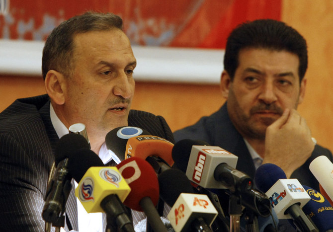 In this photo taken on October 1, 2009, Hassan Alayan (R) and Ali Faour, representatives of a group of mainly Shiite Lebanese living in the UAE, hold a press conference in Beirut after their expulsion from the UAE over their presumed affiliation with Hezbollah. (AFP/File)