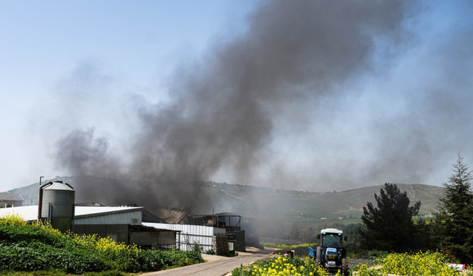 Smoke rises following the outbreak of a fire caused, according to Israel's army, by a rocket that was launched from Lebanon, amid ongoing cross-border hostilities between Hezbollah and Israeli forces, at a winery in Avivim, near Israel’s border with Lebanon in northern Israel, March 26, 2024. (REUTERS)