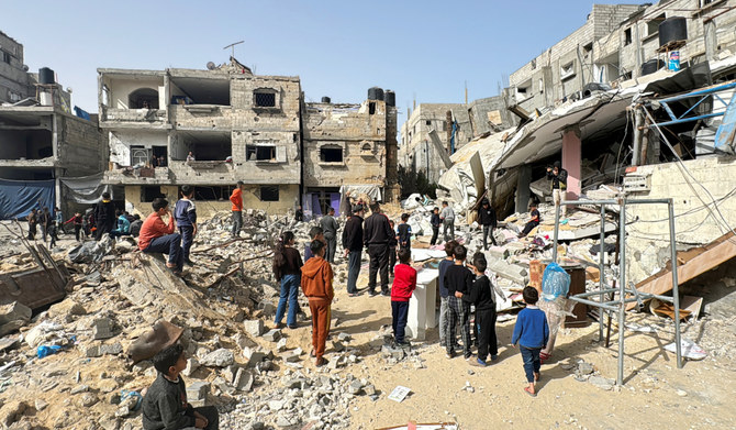 Palestinians inspect the site of an Israeli strike, amid the ongoing conflict between Israel and the Palestinian group Hamas, in Rafah, in the southern Gaza Strip. (REUTERS file photo)