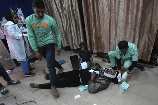Palestinians wounded in the Israeli bombardment of the Gaza Strip are brought to Al-Aqsa Martyrs Hospital in Deir al Balah, Gaza Strip, on Mar. 8, 2024. (AP)