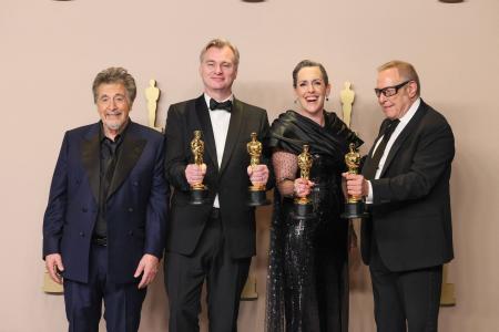 From left: Al Pacino poses with Christopher Nolan, Emma Thomas and Charles Roven, winners of the Best Picture award for “Oppenheimer”, in the press room during the 96th Annual Academy Awards at Ovation Hollywood on March 10, 2024 in Hollywood, California. (AFP)