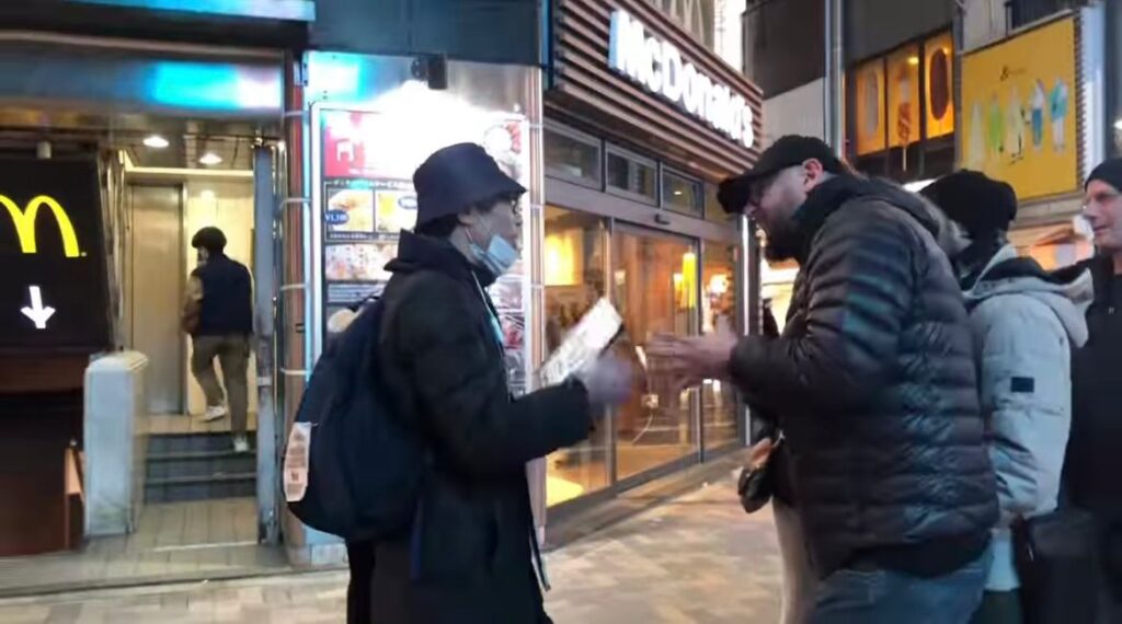 The Japanese protestor, who has braved the streets of Tokyo on his own since October, posted the video of the incident with the caption: “Against Racism.” (Instagram/@furusawayusuke_)