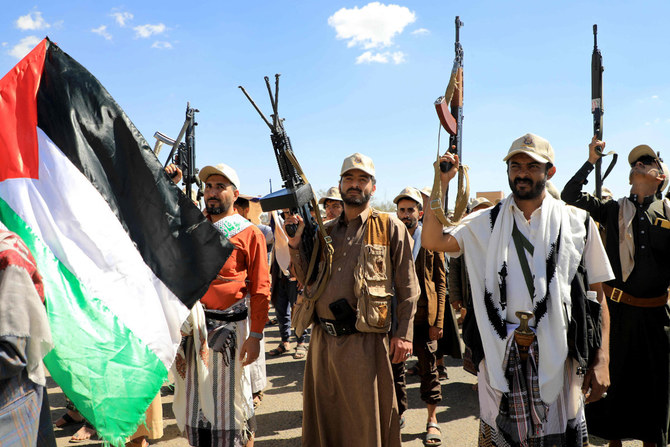 Houthis march in Sanaa, Yemen on March 7, 2024, in support of Palestinians amid the war in Gaza. (AFP)