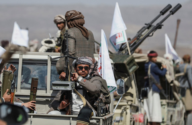 Houthi militia assemble in a show of defiance after US and UK air strikes on Houthi positions, Sanaa, Yemen, Feb. 4, 2024 (Reuters)