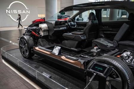 A cutaway display model of one of Nissan's electric vehicles (EV) is seen at the global headquarters of Japanese automaker Nissan Motor in Yokohama, Kanagawa prefecture on March 30, 2023. (AFP)