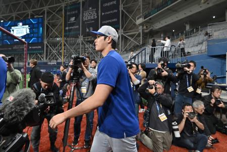 Los Angeles Dodgers' Shohei Ohtani takes the field for a baseball workout at Gocheok Sky Dome in Seoul on March 16, 2024, ahead of the 2024 MLB Seoul Series baseball game between Los Angeles Dodgers and San Diego Padres. (AFP)