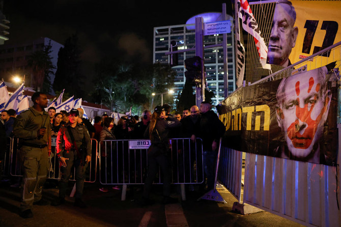 Banners with pictures of Israeli Prime Minister Benjamin Netanyahu are seen as people take part in a protest against Netanyahu's government, amid the ongoing conflict between Israel and the Palestinian Islamist group Hamas from Gaza, in Tel Aviv. (File/Reuters)