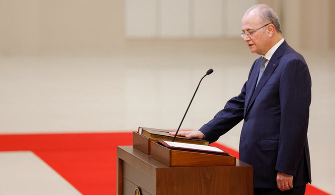 Palestinian Prime Minister Mohammad Mustafa attends a swearing-in ceremony, with his newly formed cabinet on behalf of President Mahmoud Abbas, in Ramallah, in the Israeli-occupied West Bank, March 31, 2024. (REUTERS)