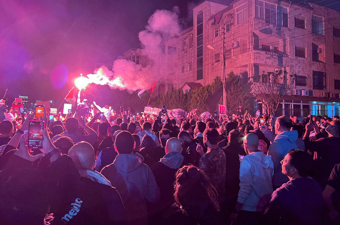 People protest in support of Palestinians in Gaza, amid the ongoing conflict between Israel and the Palestinian Islamist group Hamas, near the Israeli embassy in Amman, Jordan. (File/Reuters)