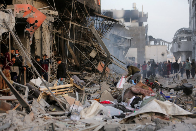 Palestinians inspect damages at Al-Shifa Hospital after Israeli forces withdrew from the hospital and the area around it following a two-week operation. (REUTERS)