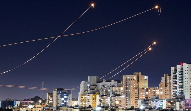 Israel's Iron Dome anti-missile system intercepts rockets launched from the Gaza Strip, amid the ongoing conflict between Israel and the Palestinian Islamist group Hamas, as seen from Ashkelon, Israel, January 15, 2024. (REUTERS)