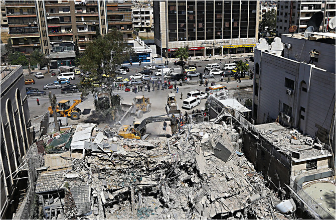 A top view shows the demolished Iranian Embassy’s consular annex in Damascus, Syria, after it was hit by an Israeli airstrike on April 1, 2024, killing at least 13 people, including two Iranian Revolutionary Guards generals and five personnel from the force. (AFP/File)