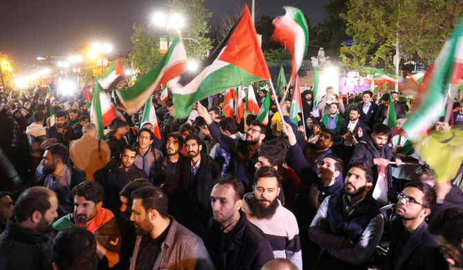 Iranian demonstrators attend an anti-Israeli gathering in front of the British Embassy in Tehran, Iran, April 14, 2024. (REUTERS)