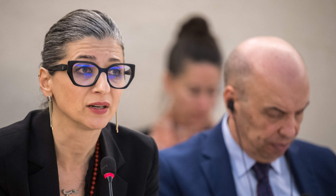 United Nations (UN) Special Rapporteur on the Rights Situation in the Palestinian Territories, Francesca Albanese, delivers her rapport next to the president of the UN Human Rights Council Omar Zniber, during a session of the UN Human Rights Council, in Geneva, on March 26, 2024. (AFP)