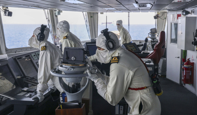 In this photo provided by the UK Ministry of Defense , members of the HMS Diamond's Bridge team shoot down a missile fired by the Iranian-backed Houthis from Yemen on April 24, 2024. (AP)