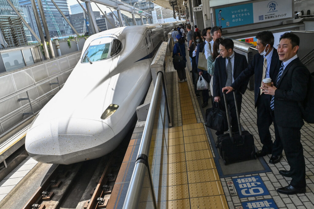 Shinkansen customers can bring small dogs, cats and other animals, including pigeons on board -- but not snakes. (AFP)
