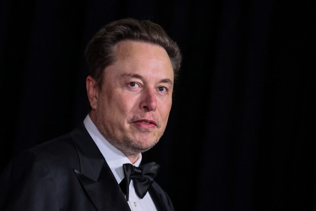 Musk told investors on a conference call that he guessed the Tesla robot, called Optimus, would be able to perform tasks in the factory by the end of this year. (AFP)