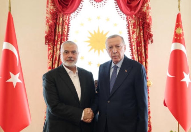 Turkiye’s President Tayyip Erdogan meets with Ismail Haniyeh, leader of the Palestinian Islamist group Hamas, in Istanbul on Apr. 20, 2024. (Reuters)