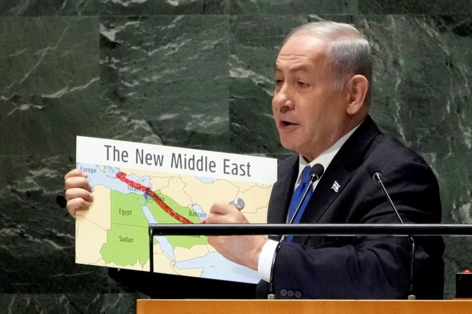 Prime Minister Benjamin Netanyahu uses a red marker on a map of ‘The New Middle East’ as he addresses the 78th session of the United Nations General Assembly, Sept. 22, 2023. (AP Photo)