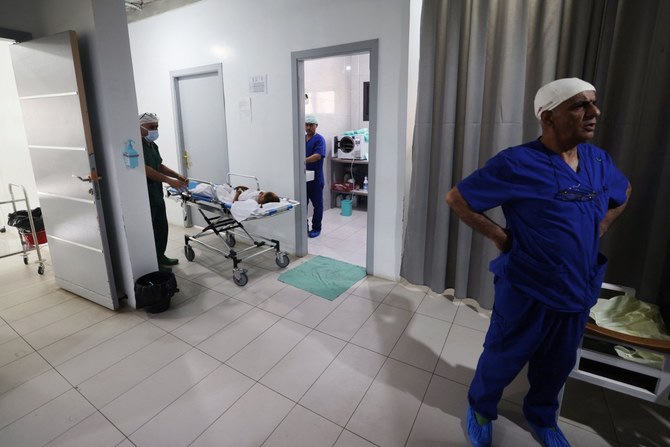 Medics care for patients at a clinic set up by Doctors Without Borders (MSF) treating severe injuries and burns sustained in Israeli bombardment, at the Rafah Indonesian Field Hospital in Rafah in the southern Gaza Strip on April 24, 2024, amid ongoing battles between Israel and the Palestinian Hamas movement.(AFP)
