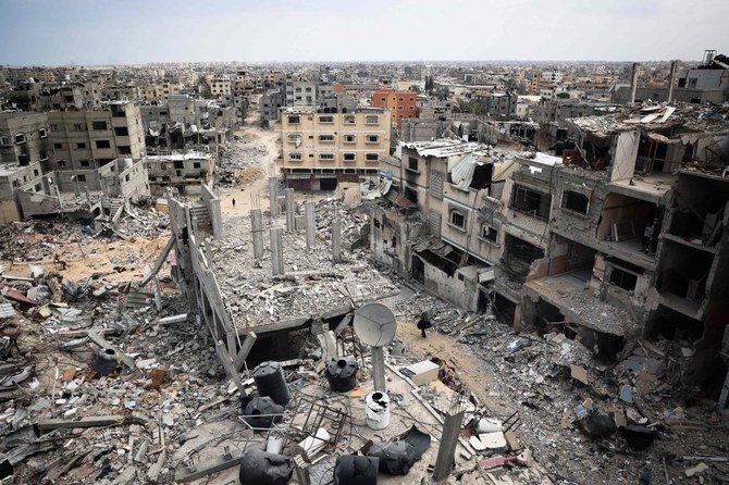 Nearly seven months of Israeli bombardment have caused billions of dollars in damage, leaving many of the crowded strip’s high-rise concrete buildings reduced to heaps. (File/AFP)