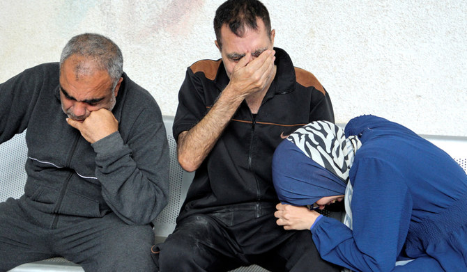 Mourners react near to the bodies of Palestinians killed in an Israeli strike, amid the ongoing conflict between Israel and the Palestinians, at Abu Yousef al-Najjar hospital in Rafah, in the southern Gaza Strip, May 5, 2024. (REUTERS)