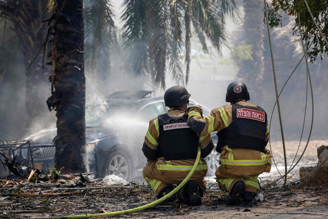 Security forces and emergency personnel deploy at a site hit by rockets fired from southern Lebanon, Kiryat Shmona, Israel, May 5, 2024. (AFP)