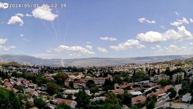 CCTV footage shows a barrage of rockets being fired from Lebanon, as seen from Kiryat Shmona, Israel, May 5, 2024. (Reuters)