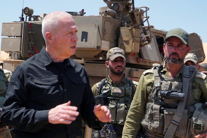 Israeli Defense Minister Yoav Gallant talks with soldiers during a visit to the border with the Gaza Strip near Rafah. (AFP/Israeli Army)