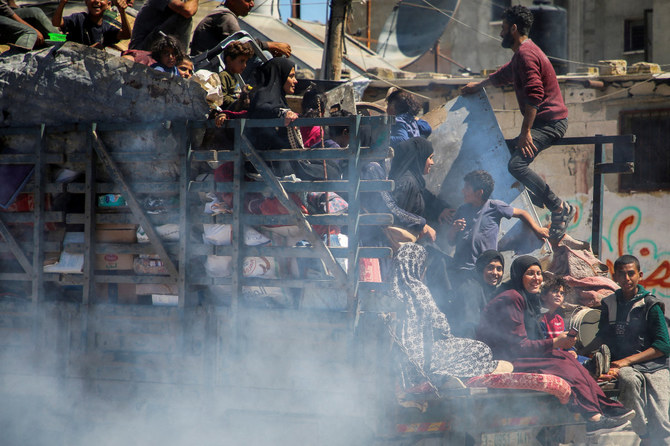 Palestinians travel in a truck as they feel Rafah after Israeli forces launched a ground and air operation in the eastern part of the southern Gaza city of Rafah on May 8, 2024. (REUTERS)