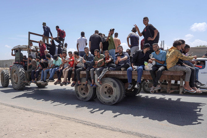 Palestinians who fled Rafah in the southern Gaza Strip arrive to take shelter in Deir el-Balah in the central part of the Palestinian territory on May 12, 2024. (AFP)
