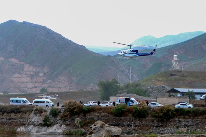 The helicopter carrying Iran’s President Ebrahim Raisi takes off at the Iranian border with Azerbaijan after the inauguration of the dam of Qiz Qalasi, in Aras. (AFP)