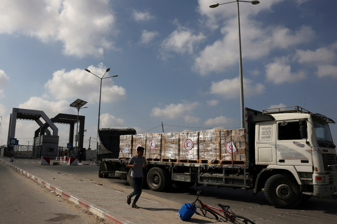 The flow of relief has often been slowed by Israeli inspections and military activity inside Gaza. (File/AFP)