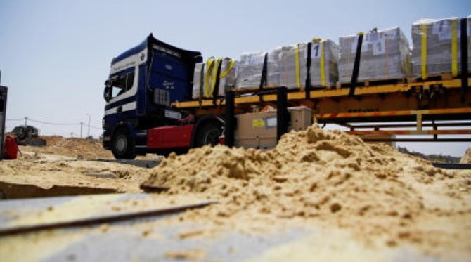 The Norwegian Refugee Council has warned that 2,000 aid trucks are stuck in Egypt at the Rafah border crossing, with Palestinians in Gaza being “actively deprived” of essential goods. (Reuter/File)
