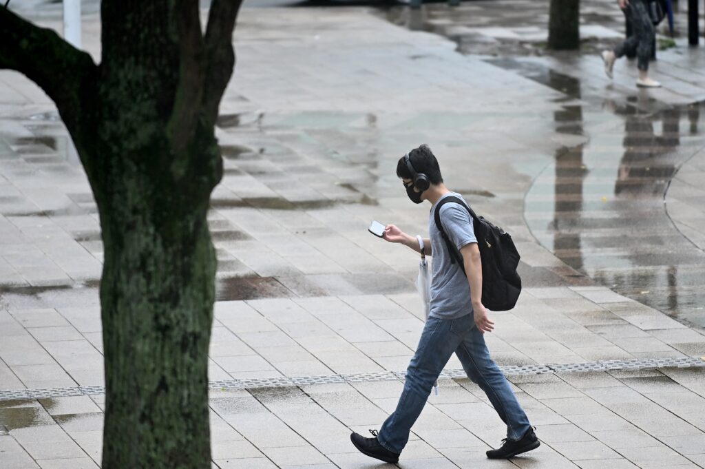 People in Japan with a “My Number” will be able use their smartphone instead of the card when they have public interactions like municipal or tax offices. (AFP)