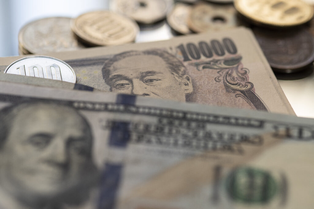 On Wednesday, the yen was at around 157.55 per dollar when it suddenly spiked, strengthening as far as 153 over the next half hour. (AFP)