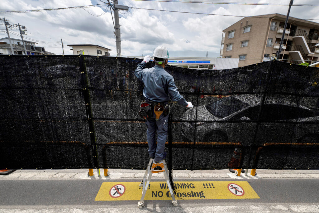 For locals, the mass of visitors and their refusal to obey rules on littering and parking had become a nuisance and traffic hazard. (AFP)