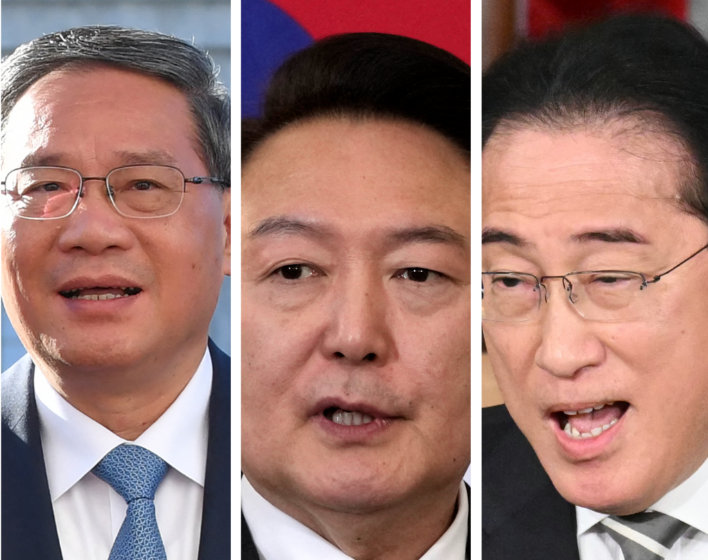 The three leaders were scheduled to hold bilateral talks among themselves on Sunday, according to the South Korean presidential office. (AFP)