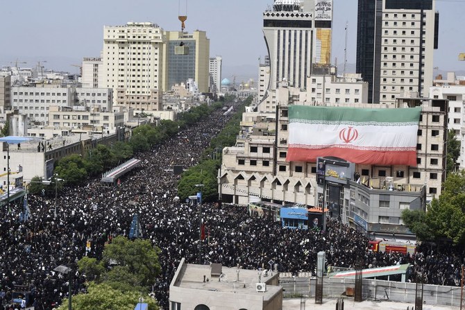 Iranian mourners attend the funeral of late president Ebrahim Raisi in the city of Mashhad on May 23, 2024. (File/AFP)