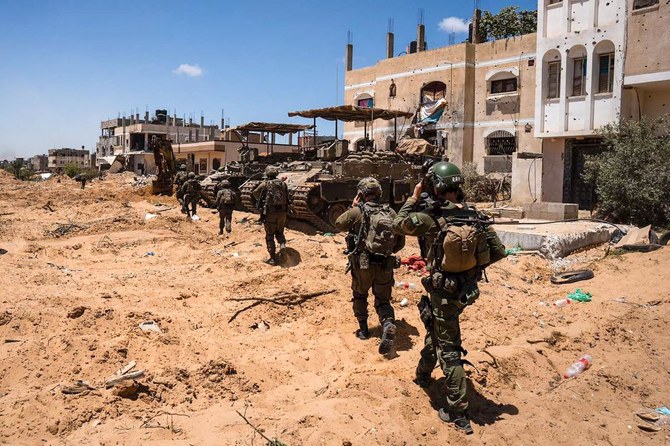 Above, Israeli soldiers during military operations in the Gaza Strip in this handout picture released on May 18, 2024. (Israeli Army/AFP)