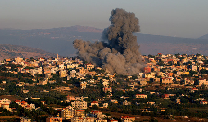 Black smoke billows following an Israeli air strike that targeted a house in the southern Lebanese village of Khiam near the Lebanese-Israeli border on June 21, 2024. (AFP)