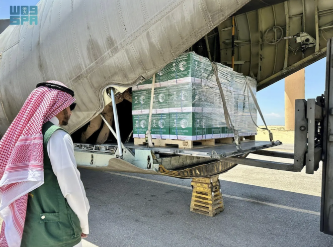 The 51st Saudi relief plane carrying medical and shelter supplies for Gazans arrives in Egypt’s El-Arish International Airport on Sunday. (SPA)