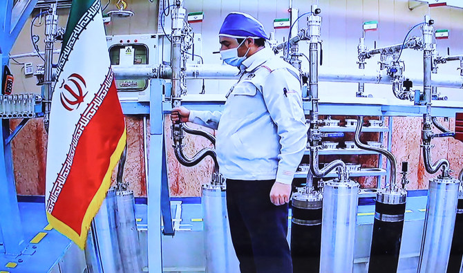 A handout picture provided by the Iranian presidential office on April 10, 2021, shows a grab of a videoconference screen of an engineer inside Iran’s Natanz uranium enrichment plant. (AFP/File)