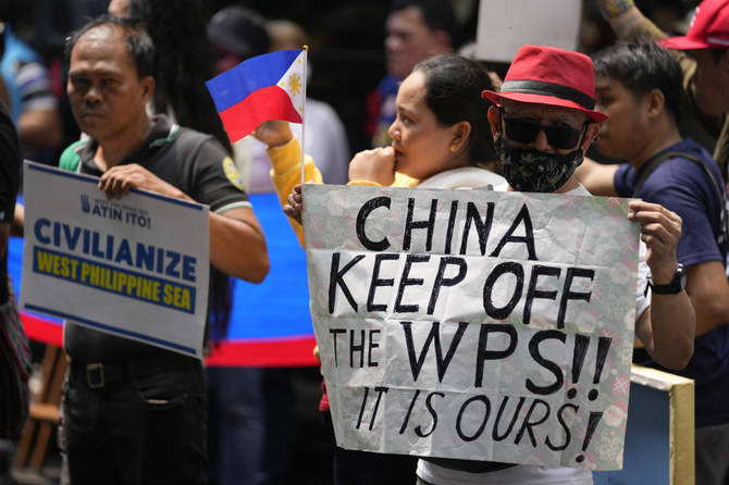 Filipino fishermen and activists protest against alleged Chinese aggression at the disputed South China Sea as they stage a rally in front of the Chinese consulate in Makati, Philippines on June 11, 2024. (AP)