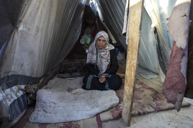 Nadia Hamouda was displaced from her home by the war between Israel and Hamas and has been living with her family in a tent in Deir al Balah, Gaza Strip, Thursday, June 13, 2024. Her daughter was killed in the war. (AP)