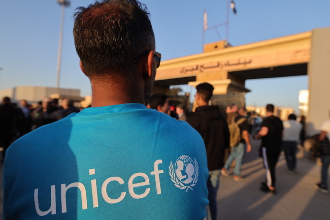 A UNICEF worker looks on by Egypt's eastern border with the Gaza Strip during the visit of UN security council ambassadors in Rafah on December 11, 2023. (File/AFP)