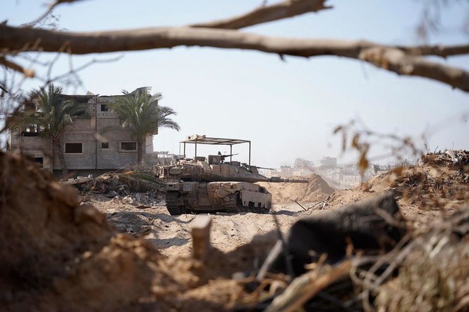 This handout picture released by the Israeli army shows an Israeli tank on the ground in the Gaza Strip on June 17, 2024. (AFP)